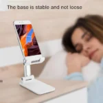 Support de téléphone portable pliable et portable, idéal pour lire ou regarder des films.