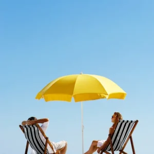 depositphotos 28392539 stock photo beach summer umbrella